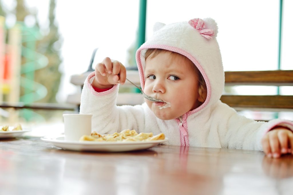 There is a cute baby was eating his breakfast - Joy of Lfie Surrogacy