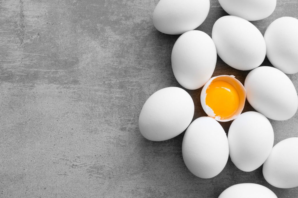 Ten White Eggs Laying on the Ground - Joy of Life Surrogacy