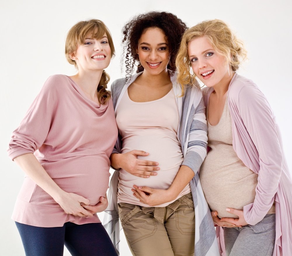 Three Surrogate mother taking picture - Joy of Life Surrogacy