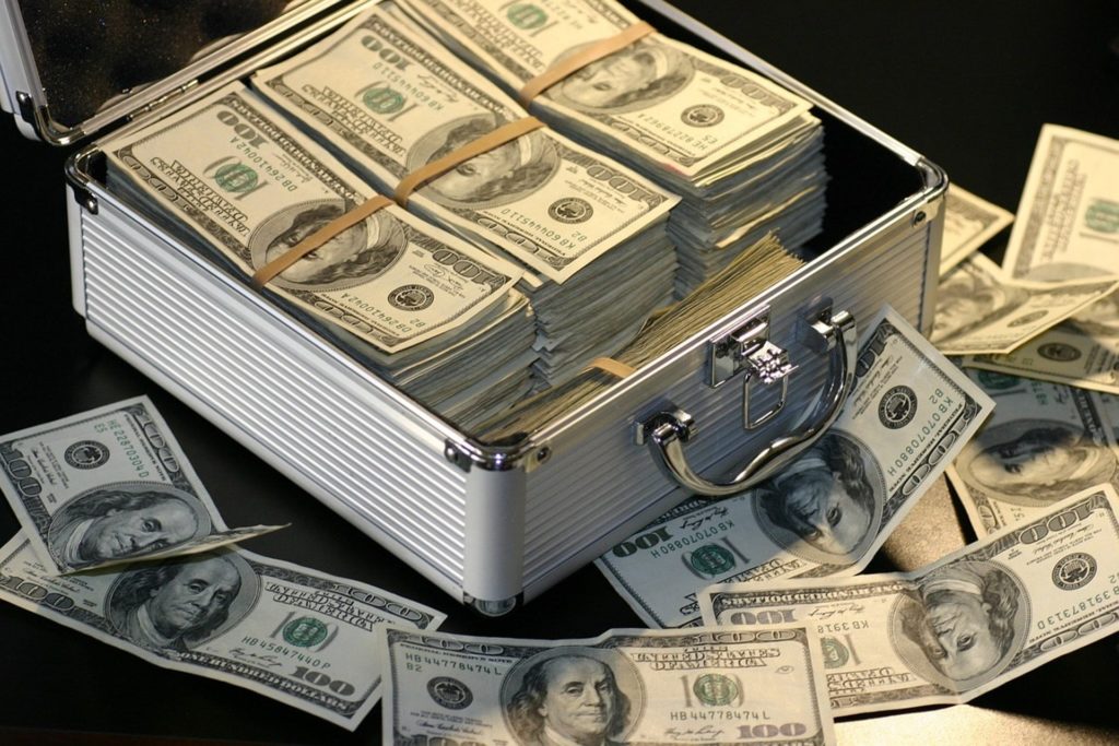 US Dollars were put in a box - Joy of Life Surrogacy